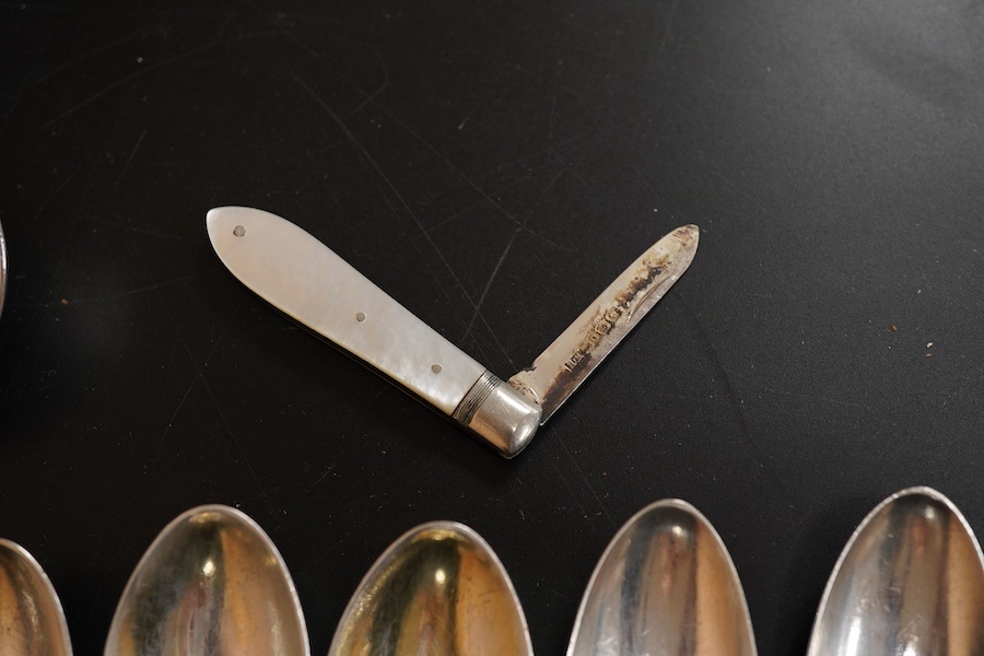 A pair of Edwardian silver Old English pattern sauce ladles, by Daniel & John Welby, London, 1901, 17.3cm, together with seven other items of silver flatware including a fiddle pattern table spoon, London, 1845 and a mot